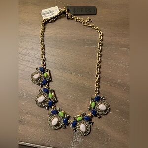 J Crew necklace with tags and drawstring branded bag